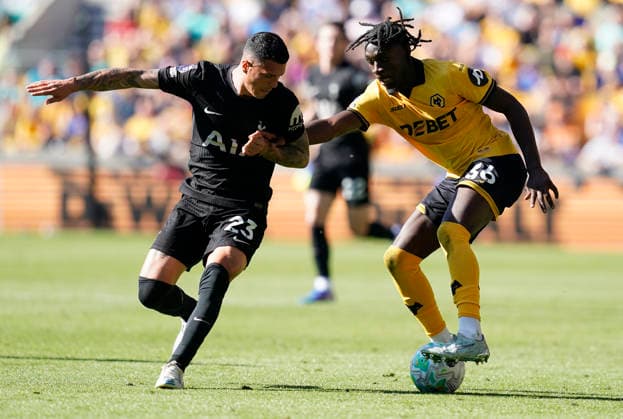 Wolverhampton, England, 25th April 2026. Mateus ManÃ of Wolverhampton Wanderers (R) is challenged by Pedro Porro of Tottenham during the Wolverhampton Wanderers vs Tottenham Hotspur Premier League match at Molineux, Wolverhampton. Picture credit should read: Andrew Yates Sportimage EDITORIAL USE ONLY. No use with unauthorised audio, video, data, fixture lists, club league logos or live services. Online in-match use limited to 120 images, no video emulation. No use in betting, games or single club league player publications. SPI_024_AY_WOLVES_SPURS SPI-4731-0023