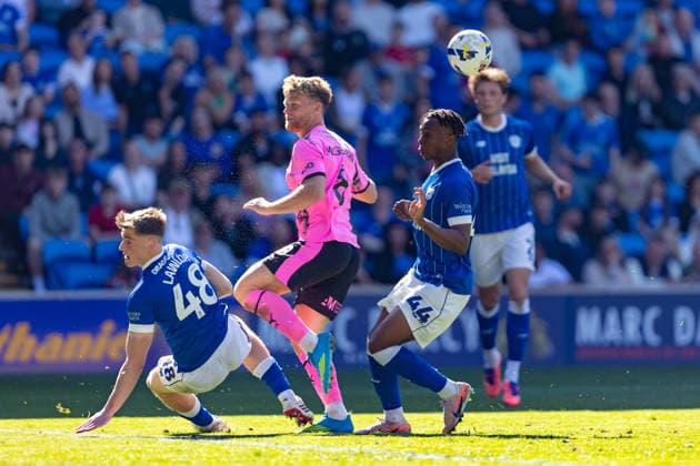Cardiff City v Northampton Town, EFL Sky Bet League 1 Northampton Town central midfielder Cameron McGeehan (8) under pressure from Cardiff City defender Ronan Kpakio (44) during the EFL Sky Bet League 1 match between Cardiff City and Northampton Town at the Cardiff City Stadium, Cardiff, UK on 25 April 2026. Cardiff Cardiff City Stadium South Glamorgan UK Editorial use only DataCo restrictions apply See www.football-dataco.com , Copyright: xDanxMintox PSI-24150-0015