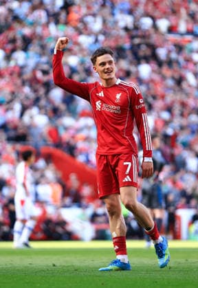 Liverpool, England, 25th April 2026. Florian Wirtz of Liverpool celebrates scoring his team™s third goal during the Liverpool vs Crystal Palace Premier League match at Anfield, Liverpool. Picture credit should read: Jessica Hornby Sportimage EDITORIAL USE ONLY. No use with unauthorised audio, video, data, fixture lists, club league logos or live services. Online in-match use limited to 120 images, no video emulation. No use in betting, games or single club league player publications. SPI_060_JH_LIVERPOOL_CRYSTAL_PALACE SPI-4733-0060