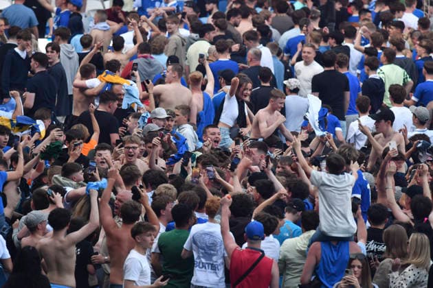 Football - 2025 2026 EFL Sky Bet League One - Cardiff City vs. Northampton Town - Cardiff City Stadium - Saturday 24th April 2026 pITCH INVASION BY CARDIFF FANS HOLDS UP PRESENTATION Pic- COLORSPORT Winston Bynorth 