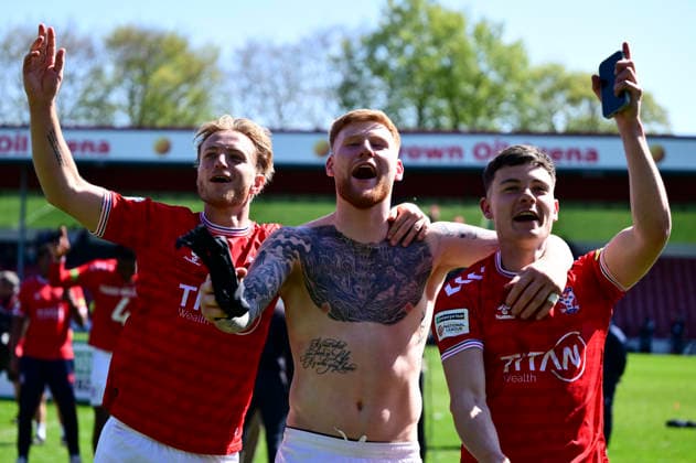 Rochdale v York City Enterprise National League (Left to right) York City s Josh Stones, Alex Hunt and Greg Olley celebrate after the Enterprise National League match at Crown Oil Arena, Rochdale 25 04 2026 UK Newspapers OUT Copyright: xChrisxNuttonx FIL-23349-0014