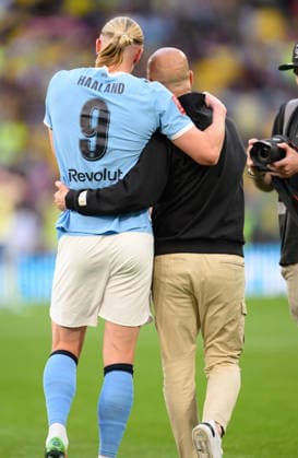 25 April 2026 - Manchester City v Southampton - FA Cup Semi-Final - Wembley Stadium. Manchester City v Southampton - FA Cup Semi-Final - Wembley Stadium. Pep Guardiola hugs Erling Haaland at the final whistle. Picture : Mark Pain London England  Copyright: xMarkxPainx