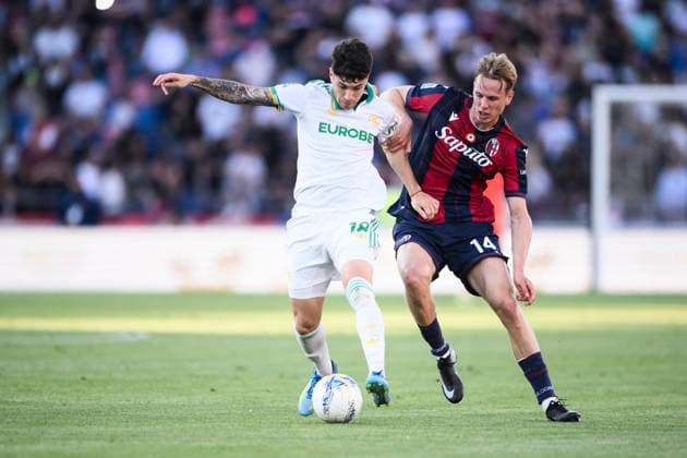 Bologna FC v AS Roma - Serie A Matias Soule of AS Roma competes for the ball with Torbjorn Heggem of Bologna FC during the Serie A football match between Bologna FC and AS Roma. Bologna Italy Copyright: xNicolòxCampox
