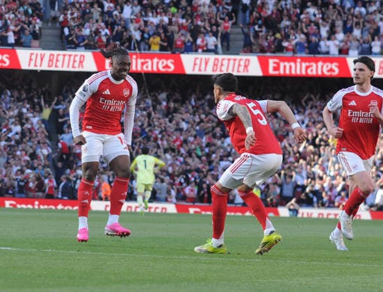 Football - 2025 2026 Premier League - Arsenal vs. Newcastle United - Emirates Stadium - Saturday 25th April 2026 Eberechi Eze celebrates his first half goal for Arsenal with Piero Hincapie 