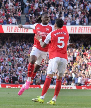 Football - 2025 2026 Premier League - Arsenal vs. Newcastle United - Emirates Stadium - Saturday 25th April 2026 Eberechi Eze celebrates his first half goal for Arsenal with Piero Hincapie 