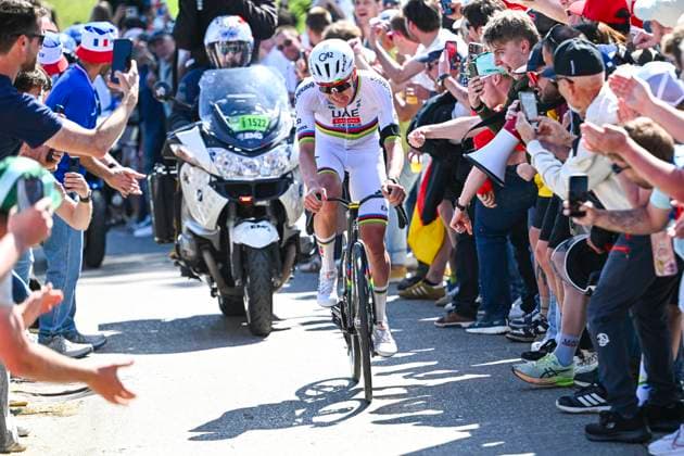 Liege Bastogne Liege 2026 Cycling Race LIEGE, BELGIUM - APRIL 26 : Pogacar Tadej (SLO) of UAE Team Emirates XRG attacking during the 112th edition of Liege Bastogne Liege an UCI World Tour 1.UWT one day cycling road race for Men Elite of 260 km with start in Liege and finish in Liege on April 26, 2026 in Liege, Belgium, 26 04 2026 ( Motordriver Guy De Vuyst - Liege Belgium  Copyright: xVincentxKalutx