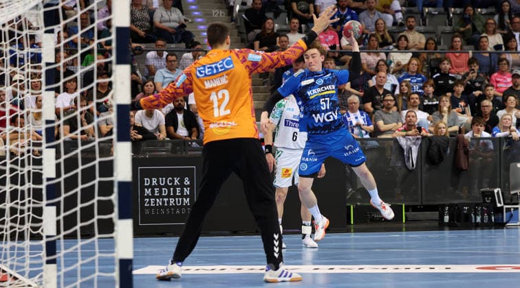 26.04.2026 Stuttgart, Handball TVB Stuttgart vs. SC Magdeburg, v.l. Matej Mandic (Magdeburg), Jakob Nigg (TVB)