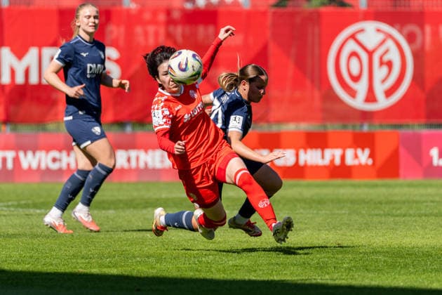 Spielszene, Zweikampf, v.l. Yurina Imai (1. FSV Mainz 05, 14), Lilith Schmidt (VfL Bochum, 30), GER, 1. FSV Mainz 05 vs. VfL Bochum, Fussball, 2. Frauen-Bundesliga, 23. Spieltag, Saison 2025 2026, 26.04.2026, DFB REGULATIONS PROHIBIT ANY USE OF PHOTOGRAPHS AS IMAGE SEQUENCES AND OR QUASI-VIDEO, GER, 1. FSV Mainz 05 vs. VfL Bochum, Fussball, 2. Frauen-Bundesliga, 23. Spieltag, Saison 2025 2026, 26.04.2026 Mainz Copyright: xEibner-Pressefoto Jan-NiclasxGrox EP_JGG