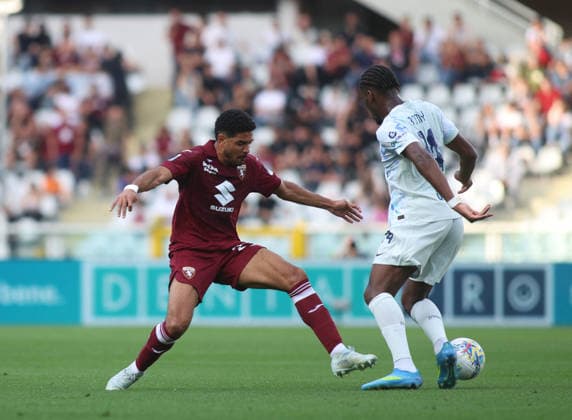 CALCIO - Serie A - Torino FC vs Inter - FC Internazionale Saul Coco of Torino FC and Ange-Yoan Bonny of FC Inter during the Italian Serie A, football match between Torino FC and FC Inter Milan on 26 April 2026, at Stadio Olimpico Grande Torino, Turin, Italy. Photo Nderim Kaceli Turin Italy  Copyright: xIPAxSport ABACAx