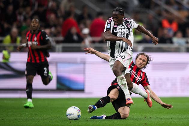 AC Milan v Juventus FC - Serie A Jonathan David of Juventus FC is tackled by Luka Modric of AC Milan during the Serie A football match between AC Milan and Juventus FC. Milan Italy Copyright: xNicolòxCampox