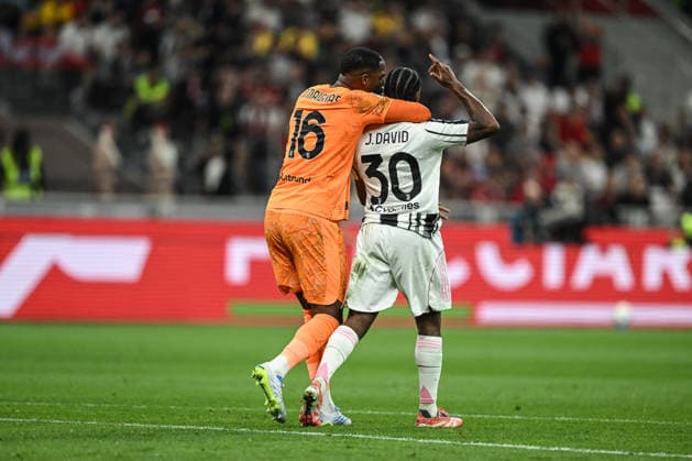 Mike Maignan of AC Milan and Jonathan David FC Juventus react during the Italian Serie A football match between Inter AC Milan and FC Juventus on 26 of April 2026 at Giuseppe Meazza San Siro Siro stadium in Milan, Italy. Credit: Tiziano Ballabio  Copyright: xTizianoxBallabio IPAxSportx xipa-agency.netx xx IPA_74258386 IPA_Agency_IPA74258386
