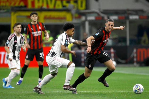 MILAN, ITALY - APRIL 26: Adrien Rabiot of AC Milan competes for the ball with Weston McKennie of Juventus FC ,during the Serie A match between AC Milan and Juventus FC at Giuseppe Meazza Stadium on April 26, 2026 in Milan, Italy.  Copyright: xMBxMediax