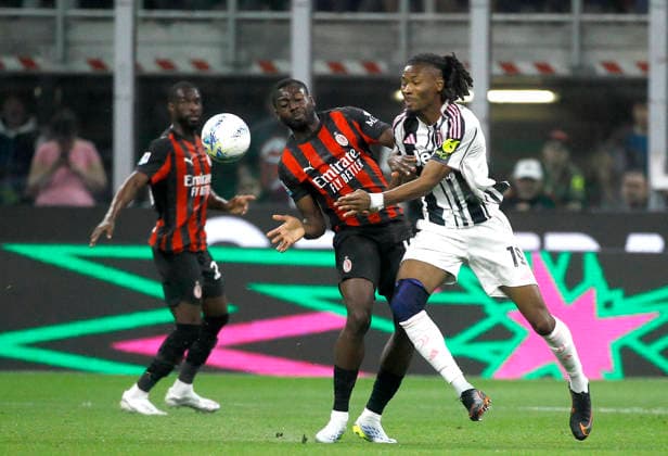 MILAN, ITALY - APRIL 26: Khephren Thuram of Juventus FC competes for the ball withY oussouf Fofana of AC Milan ,during the Serie A match between AC Milan and Juventus FC at Giuseppe Meazza Stadium on April 26, 2026 in Milan, Italy.  Copyright: xMBxMediax