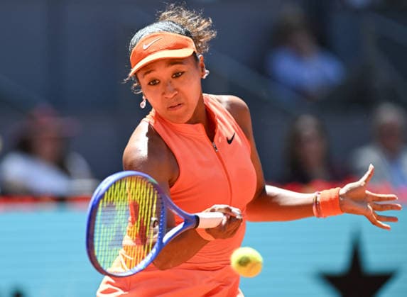 (260427) -- MADRID, April 27, 2026 -- Osaka Naomi of Japan hits a return during the women s singles round of 16 match between Aryna Sabalenka of Belarus and Osaka Naomi of Japan at the 2026 Madrid Open tennis tournament in Madrid, Spain, on April 27, 2026. ) (SP)SPAIN-MADRID-TENNIS-MADRID OPEN-WOMEN S SINGLES ChengxMin 