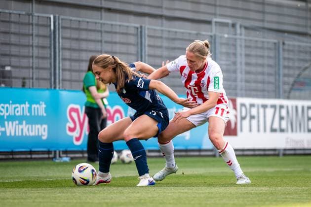 Jamilla Rankin (5; TSG Hoffenheim) im Zweikampf mit Pauline Bremer (11; 1. FC Köln) im Dietmar-Hopp Stadion GPFBL: TSG Hoffenheim - 1. FC Köln, 27.04.2026 Copyright: xSpeedshotx