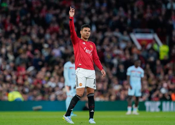 Manchester, England, 27th April 2026. Casemiro of Manchester United, ManU celebrates scoring their sides first goal during the Manchester United vs Brentford Premier League match at Old Trafford, Manchester. Picture credit should read: Andrew Yates Sportimage EDITORIAL USE ONLY. No use with unauthorised audio, video, data, fixture lists, club league logos or live services. Online in-match use limited to 120 images, no video emulation. No use in betting, games or single club league player publications. SPI_022_AY_MANCHESTER_UNITED_V_BRENTFORD SPI-4740-0022