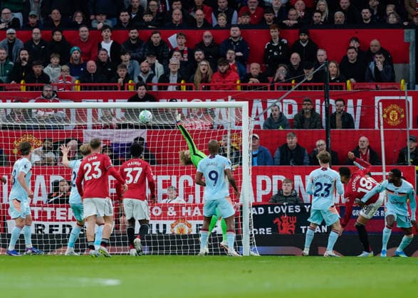 Manchester, England, 27th April 2026. Casemiro of Manchester United, ManU scores their sides first goal during the Manchester United vs Brentford Premier League match at Old Trafford, Manchester. Picture credit should read: Andrew Yates Sportimage EDITORIAL USE ONLY. No use with unauthorised audio, video, data, fixture lists, club league logos or live services. Online in-match use limited to 120 images, no video emulation. No use in betting, games or single club league player publications. SPI_021_AY_MANCHESTER_UNITED_V_BRENTFORD SPI-4740-0021