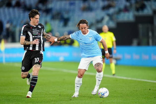 SS Lazio v Udinese Calcio - Serie A Enilive Luca Pellegrini of SS Lazio and Nicolo Zaniolo of Udinese Calcio compete for the ball during the serie Serie A Enilive match between SS Lazio and Udinese Calcio at Olimpico on April 27, 2026 in Rome, Italy Rome Stadio Olimpico Lazio Italy Copyright: xGiuseppexMaffiax 260427_SerieA_Lazio-Udinese_GM_01762