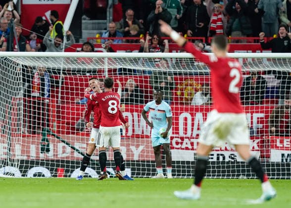 Manchester, England, 27th April 2026. Benjamin Sesko of Manchester United, ManU celebrates scoring their sides second goal with Bruno Fernandes of Manchester United during the Manchester United vs Brentford Premier League match at Old Trafford, Manchester. Picture credit should read: Andrew Yates Sportimage EDITORIAL USE ONLY. No use with unauthorised audio, video, data, fixture lists, club league logos or live services. Online in-match use limited to 120 images, no video emulation. No use in betting, games or single club league player publications. SPI_043_AY_MANCHESTER_UNITED_V_BRENTFORD SPI-4740-0043