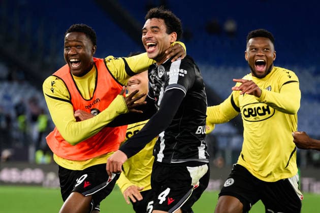 Arthur Atta of Udinese Calcio (c) celebrates with team mates after scoring the goal of 2-3 during the Serie A 2025 2026 football match between SS Lazio and Udinese Calcio at Stadio Olimpico in Rome (Italy), April 27, 2026. AndreaxStaccioli