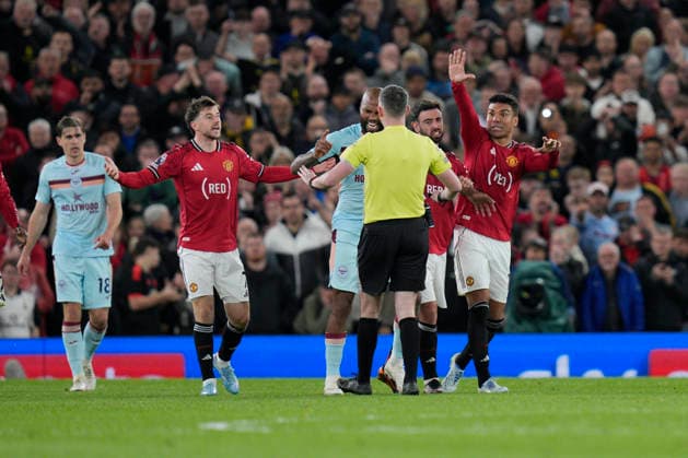 27th April 2026; Old Trafford, Manchester, England; Premier League Football, Manchester United, ManU versus Brentford; Bruno Fernandes of Manchester United, Casemiro of Manchester United and Mason Mount of Manchester United appeal to Referee, Chris Kavanagh for a decision StevexFlynn