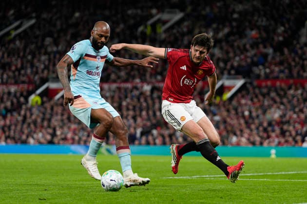 27th April 2026; Old Trafford, Manchester, England; Premier League Football, Manchester United, ManU versus Brentford; Harry Maguire of Manchester United competes for the ball with Igor Thiago of Brentford StevexFlynn