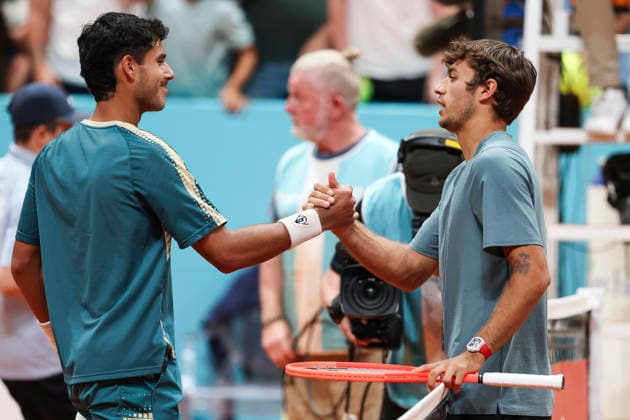 April 27, 2026, Madrid, Madrid, Spain: Adolfo Daniel Vallejo of Paraguay and Flavio Cobolli of Italy greet each other during the Mutua Madrid Open 2026, ATP, Tennis Herren Masters 1000 and WTA, Tennis Damen 1000, at La Caja Magica on April 27, 2026 in Madrid, Spain. Mutua Madrid Open 2026 - Day 8 - ZUMAa181 20260427_zaa_a181_879 Copyright: xIrinaxR.xHipolitox