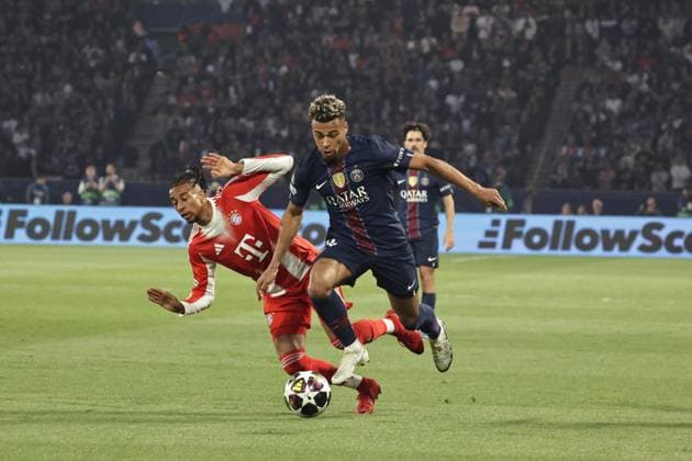 PSG - BAYERN PHOTOPQR LE PARISIEN LP Fred Dugit (Staff) ; Paris ; 28 04 2026 ; Sports Parc des Princes, Paris (XVIe), le 28 04 2026 Demi-finale aller de ligue des Champions Psg-Bayern Munich Willian Pacho (51) et Désiré Doué (14) LP Fred Dugit Paris, France, april 28th 2026. Champions League. Semi-final (First leg) Paris PSG - Bayern Munich.