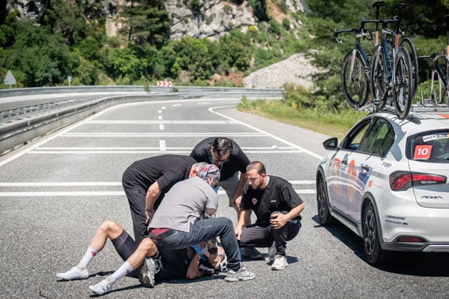 61st Presidential Cycling Tour of Turkiye MUGLA, TURKIYE - APRIL 29: Medical personnel and team staff attend to a fallen rider on the road during the 130-kilometer Marmaris-Fethiye stage of the 61st Presidential Cycling Tour of Turkiye (TUR 2026) on April 29, 2026, in Mugla, Turkiye. This 8-stage event is the only competition in the country classified as a ProSeries race on the UCI Europe Tour calendar. The tour is organized by the Turkish Cycling Federation under the auspices of the Presidency and receives support from the Ministry of Youth and Sports. Ahmet Serdar Eser Anadolu Mugla Turkey. Editorial use only. Please get in touch for any other usage.  Copyright: x2026xAnadoluxAhmetxSerdarxEserx