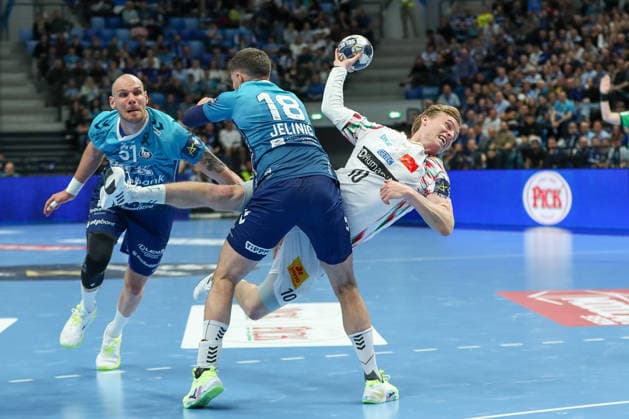 29.04.2026, xgox, Handball - EHF Champions League - 1 4 Finale Pick Szeged - SC Magdeburg v.l. Marin Jelinic (Szeged, 18), Gisli Thorgeir Kristjansson (Magdeburg, 10) Zweikampf, Duell, Kampf, tackle Szeged