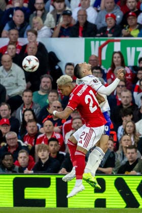 Nottingham Forest v Aston Villa, Europa League, Semi Final First Leg Nottingham Forest midfielder Omari Hutchinson (21) battles for header with Aston Villa midfielder Emi Buendia (10) during the Europa League semi-final 1st leg match between Nottingham Forest and Aston Villa at the City Ground, Nottingham, UK on 30 April 2026. Nottingham City Ground Nottinghamshire UK Editorial use only , Copyright: xManjitxNarotrax PSI-24183-0081