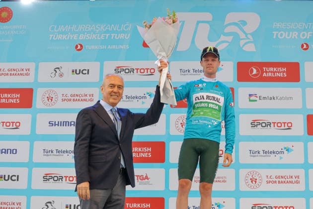 The 61st Presidential Cycling Tour of Turkiye (TUR 2026) has officially begun, starting with its opening stage in the coastal town of Cesme, Izmir. Held under the auspices of the Presidency of the Republic of Türkiye, this prestigious UCI ProSeries race brings together 23 teams and 161 world-class cyclists to compete over eight days, from April 26 to May 3, 2026...The 2026 edition unfolds across routes showcasing some of Türkiye s most striking landscapes. Starting in Cesme, the race follows the Aegean and Mediterranean coastlines, covering stages through Antalya and the southern shores before concluding in the capital, Ankara. Beyond sporting competition, the tour plays a key role in promoting Türkiye s natural and cultural richness on a global stage..This year, the race consists of 8 stages covering approximately 1,200 kilometers. Nearly 20 teams and over 150 riders from around the world are competing, under the coordination of the Turkish Cycling Federation..With the first three stages completed, the pace in the peloton has intensified and the general classification has begun to take shape. Sprint finishes and technically demanding routes have stood out, with the third stage drawing attention for its high tempo and dramatic finale..The third stage of the 61st Presidential Cycling Tour of Türkiye (TUR 2026) was won by Colombian rider Ivan Ramiro Sosa of Equipo Kern Pharma. Covering the 132.7-kilometer Marmaris-Kıran route, Sosa finished in 3 hours, 40 minutes, and 25 seconds. In the summit finish, Australian rider Sebastian Berwick of Caja Rural-Seguros RGA placed second, while French rider Nicolas Breuillard of TotalEnergies finished third..As the race progresses, challenging climbs and critical time gaps are expected to further heighten the excitement. The tour continues to deliver a compelling blend of elite competition and global vis Copyright: RizaxOzel 19081558
