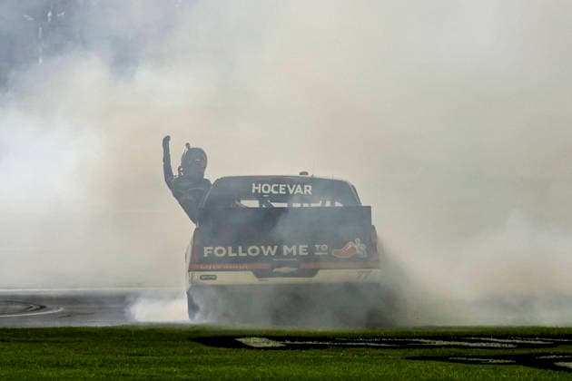FORT WORTH, TX - MAY 01: Spire Motorsports driver Carson Hocevar (77) does a burnout after winning the NASCAR, Motorsport, USA Craftsman Truck Series SpeedyCash.com 250 on May 01, 2026 at Texas Motor Speedway in Fort Worth, Texas. (Photo by Matthew Pearce Icon Sportswire) AUTO: MAY 01 NASCAR CRAFTSMAN Truck Series SpeedyCash.com 250 EDITORIAL USE ONLY Icon1692605012953250