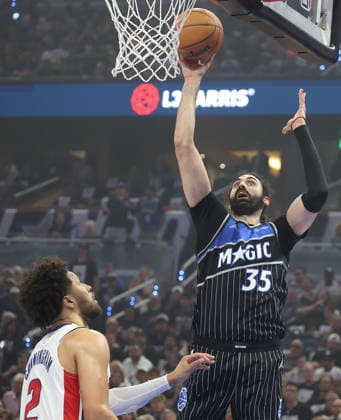 May 1, 2026, Orlando, Fl - Florida, USA: The Orlando Magic s Goga Bitadze (35) scores against the Detroit Pistons Cade Cunningham (2) during the first half in Game 6 of a first-round playoff series at the Kia Center on Friday, May 1, 2026, in Orlando, Florida. Sports News - May 1, 2026  - ZUMAm67_ 20260501_zaf_m67_009 Copyright: xStephenxM.xDowellx