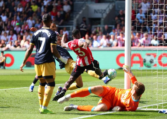 2nd May 2026; Gtech Community Stadium, Brentford, London, England; Premier League Football, Brentford versus West Ham United; Michael Kayode of Brentford scoring his sides 1st goal in the 15th minute to make it 1-0 but was ruled an own goal from Konstantinos Mavropanos of West Ham United JPxFletcher
