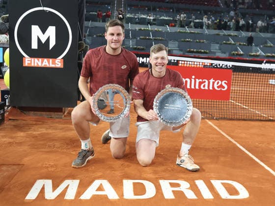 Alberto Simon Harri Heliovaara and Henry Patten pose with the winners trophies during the awards ceremony for the men s doubles final of the Mutua Madrid Open tennis tournament at the Caja Magica in Madrid on May 2, 2026. Copyright: xALBERTOxSIMONx AgenciaxLOFx