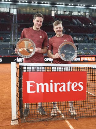 Alberto Simon Harri Heliovaara and Henry Patten pose with the winners trophies during the awards ceremony for the men s doubles final of the Mutua Madrid Open tennis tournament at the Caja Magica in Madrid on May 2, 2026. Copyright: xALBERTOxSIMONx AgenciaxLOFx