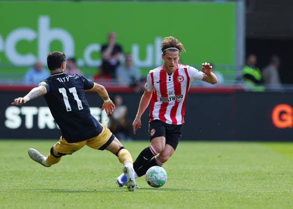 2nd May 2026; Gtech Community Stadium, Brentford, London, England; Premier League Football, Brentford versus West Ham United; Mathias Jensen of Brentford under pressure from Valentin Castellanos of West Ham United JPxFletcher