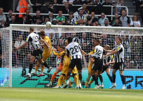 Newcastle Upon Tyne, England, 2nd May 2026. Dan Burn (L) of Newcastle United heads to score the second goal during the Newcastle United vs Brighton and Hove Albion Premier League match at St. James Park, Newcastle Upon Tyne. Picture credit should read: Nigel Roddis Sportimage EDITORIAL USE ONLY. No use with unauthorised audio, video, data, fixture lists, club league logos or live services. Online in-match use limited to 120 images, no video emulation. No use in betting, games or single club league player publications. SPI_019_NR_NEWC_BRIG SPI-4784-0010