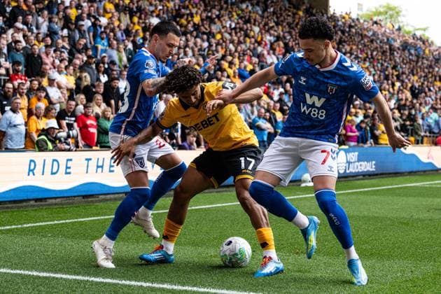 2nd May 2026; Molineux Stadium, Wolverhampton, West Midlands, England; Premier League Football, Wolverhampton Wanderers versus Sunderland; Pedro Lima of Wolverhampton Wanderers holds off Chemsdine Talbi and Enzo Le Fee of Sunderland AFC GodfreyxPitt