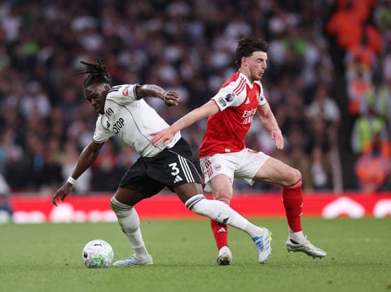 London, England, 2nd May 2026. Calvin Bassey of Fulham tackles Declan Rice of Arsenal during the Arsenal vs Fulham Premier League match at the Emirates Stadium, London. Picture credit should read: David Klein Sportimage EDITORIAL USE ONLY. No use with unauthorised audio, video, data, fixture lists, club league logos or live services. Online in-match use limited to 120 images, no video emulation. No use in betting, games or single club league player publications. SPI_026_DK_Arsenal_Fulham SPI-4774-0026