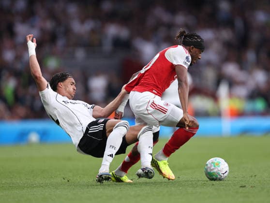 London, England, 2nd May 2026. Antonee Robinson of Fulham tackles Noni Madueke of Arsenal during the Arsenal vs Fulham Premier League match at the Emirates Stadium, London. Picture credit should read: David Klein Sportimage EDITORIAL USE ONLY. No use with unauthorised audio, video, data, fixture lists, club league logos or live services. Online in-match use limited to 120 images, no video emulation. No use in betting, games or single club league player publications. SPI_029_DK_Arsenal_Fulham SPI-4774-0029