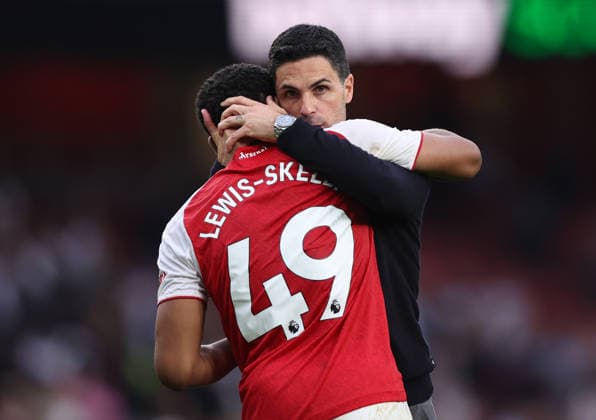 London, England, 2nd May 2026. Myles Lewis-Skelly of Arsenal celebrates with Mikel Arteta manager of Arsenal during the Arsenal vs Fulham Premier League match at the Emirates Stadium, London. Picture credit should read: David Klein Sportimage EDITORIAL USE ONLY. No use with unauthorised audio, video, data, fixture lists, club league logos or live services. Online in-match use limited to 120 images, no video emulation. No use in betting, games or single club league player publications. SPI_043_DK_Arsenal_Fulham SPI-4774-0042