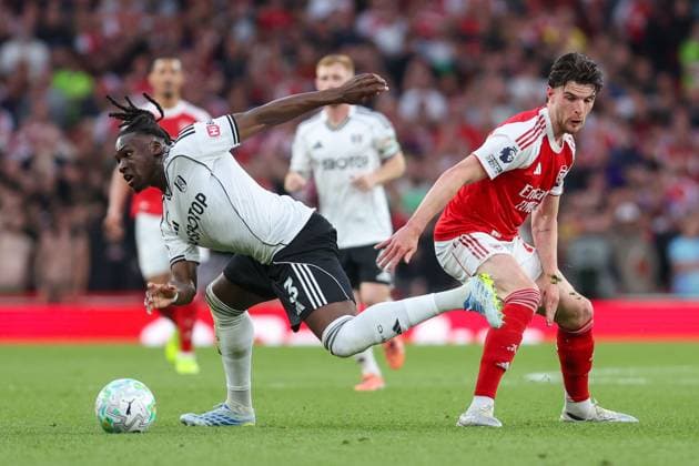 Calvin Bassey of Fulham is challenged by Declan Rice of Arsenal Arsenal v Fulham, Football, Premier League, Emirates Stadium, London, UK - 02 05 2026 EDITORIAL USE ONLY No use with unauthorised audio, video, data, fixture lists, club league logos or live services. Online in-match use limited to 120 images, no video emulation. No use in betting, games or single club league player publications.  Copyright: xAnthonyxHanc Shutterstockx 16856541q