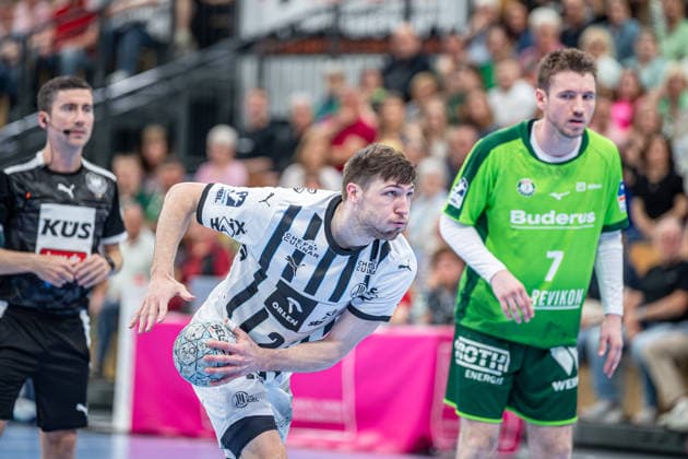 Handball Bundesliga; HSG Wetzlar - THW Kiel, 02.05.26 Lukas Zerbe (THW Kiel, 24), Dominik Mappes (HSG Wetzlar, 7) Handball Bundesliga; HSG Wetzlar - THW Kiel: Wetzlar, 02.05.26 Copyright: xBEAUTIFULxSPORTS Roeczeyx