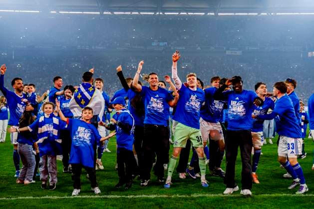 Johannes Siebeking of FC Schalke 04 and Mertcan Ayhan of FC Schalke 04 and team of FC Schalke 04 celebrate winning the league title FC Schalke 04 v Fortuna Dusseldorf, 2. Bundesliga, FC Schalke 04 v Fortuna Dusseldorf, Veltins-Arena, May 2, 2026, Gelsenkirchen, Germany.