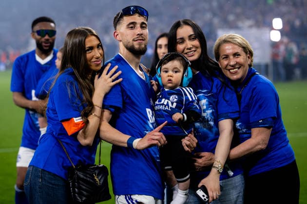 GELSENKIRCHEN, GERMANY - MAY 2: Adil Aouchiche of FC Schalke 04 celebrates promotion with his family after the 2. Bundesliga match between FC Schalke 04 and Fortuna Dusseldorf at the Veltins-Arena on May 2, 2026 in Gelsenkirchen, Germany.  Copyright: xRenexNijhuis MBxMediax