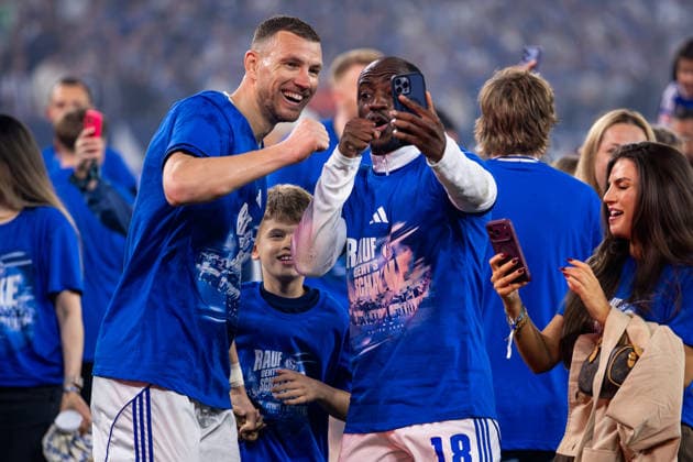 GELSENKIRCHEN, GERMANY - MAY 2: Edin Dzeko of FC Schalke 04 and Christopher Antwi Adjei of FC Schalke 04 celebrate promotion after the 2. Bundesliga match between FC Schalke 04 and Fortuna Dusseldorf at the Veltins-Arena on May 2, 2026 in Gelsenkirchen, Germany.  Copyright: xRenexNijhuis MBxMediax