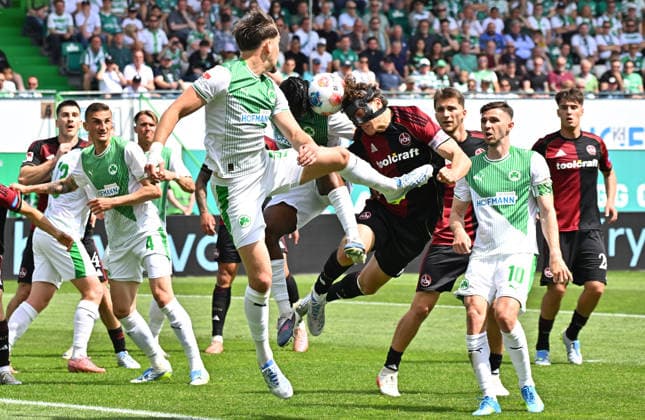 03.05.2026 - Fussball - Saison 2025 2026 - 2. Fussball - Bundesliga - Derby Frankenderby - 32. Spieltag: SpVgg Greuther Fürth ( Kleeblatt ) - 1. FC Nürnberg FCN ( Club ) - Sportfoto Zink MeZi - xmexzix - DFL regulations prohibit any use of photographs as image sequences and or quasi-video - only for editorial use - Reno Münz Muenz (5, SpVgg Greuther Fürth ) Noel Futkeu (9, SpVgg Greuther Fürth ) Fabio Gruber (4, 1. FC Nürnberg FCN )