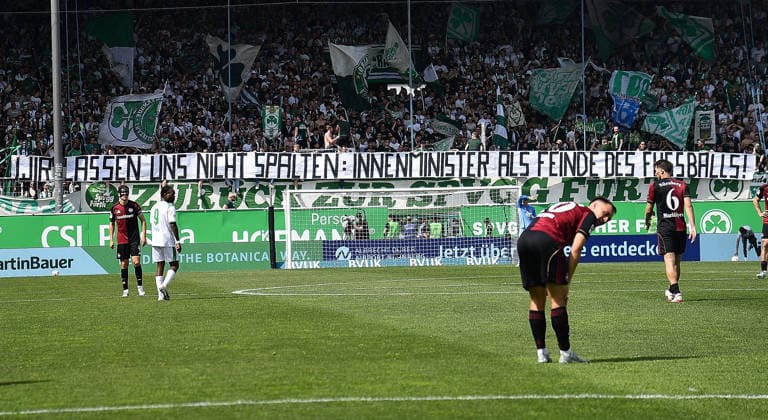 03.05.2026, xhbx, Fussball 2.Bundesliga, SpVgg Greuther Fuerth - 1.FC Nürnberg v.l. Fans, Anhänger, Fahne, Banner Innenminister , Schal von Spvgg. Greuther Fuerth (DFL DFB REGULATIONS PROHIBIT ANY USE OF PHOTOGRAPHS as IMAGE SEQUENCES and or QUASI-VIDEO) Fuerth
